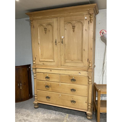 112 - Victorian pine press with two doors over four drawers (shelves to the interior) 226H 150W 64D