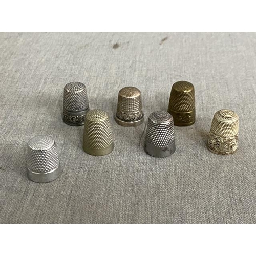 273 - 7 thimbles including silver examples