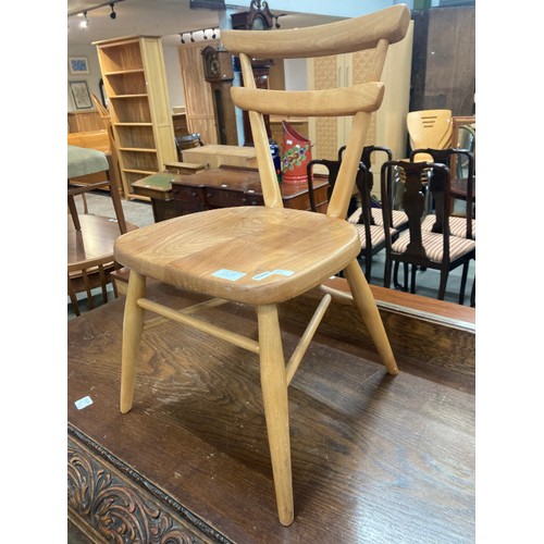 130 - Ercol stacking child's chair with solid elm seat and beech legs and back rest (missing the Ercol lab... 