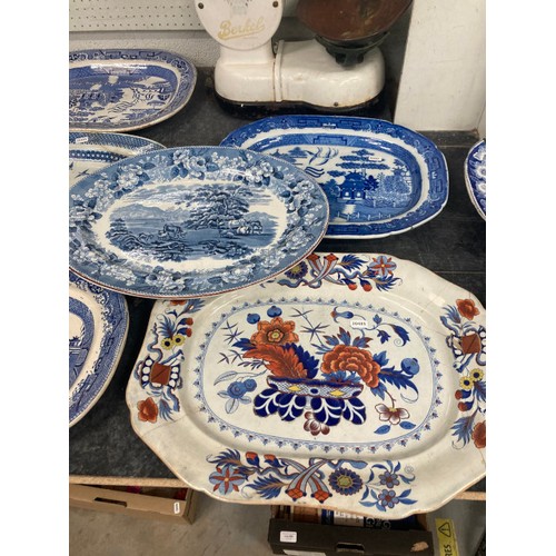 335 - 14 large antique blue and white meat plates including Georgian (some as found)