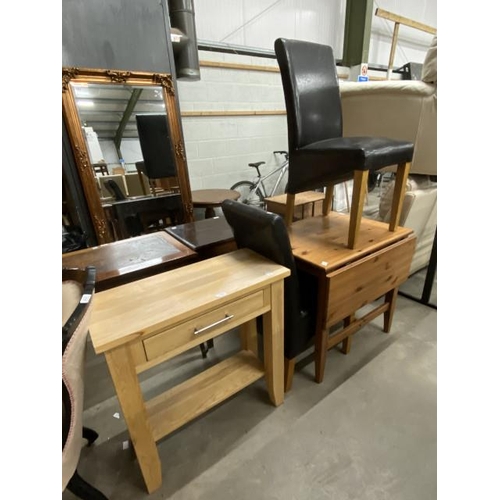 26 - Pine drop leaf kitchen table 75H 64-120W 78D with 2 brown leather high back chairs and an oak single... 