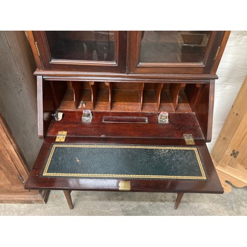 10 - Antique mahogany bureau bookcase with two inkwells to the interior 174H 83W 45D