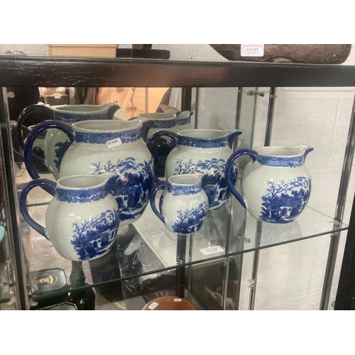 358 - 5 graduated ironstone jugs