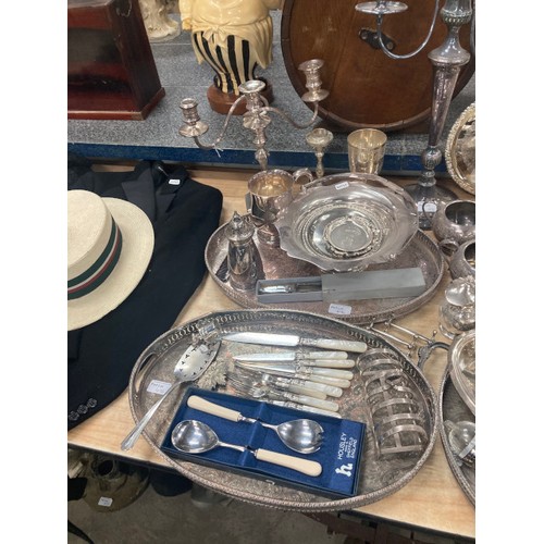 476 - Nice collection of silver plate including 2 candelabras 28 and 49H, 3 galleried trays, goblets, suga... 