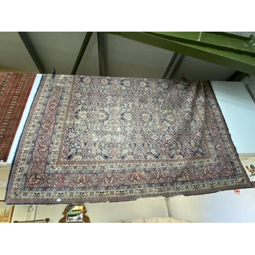 112 - Burgundy and blue ground Persian rug 390 x 325cm (worn - sold as seen)