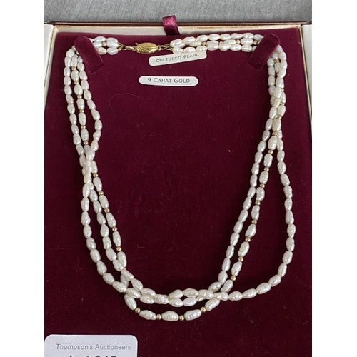 345 - 9ct gold clasped triple string freshwater pearl necklace, 40cm