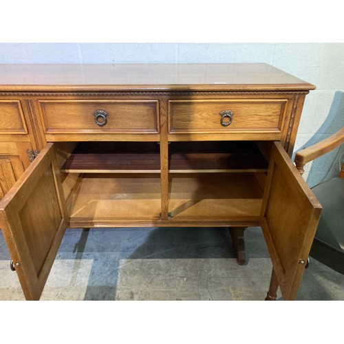 102 - Jaycee oak four door/four drawer sideboard 87H 187W 50D