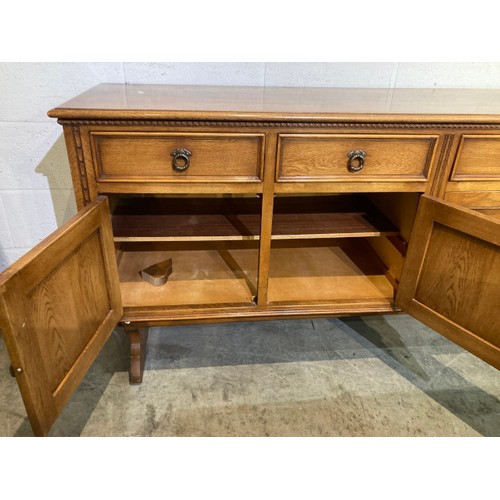 102 - Jaycee oak four door/four drawer sideboard 87H 187W 50D