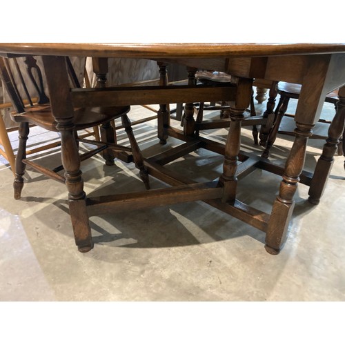 128 - Good quality oak gate leg table 73H 122W 60-180D and 4 chairs