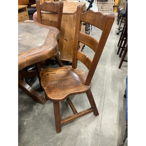 76 - Oak farmhouse dining table with tiled top 76H 130cm diameter with 4 chairs and a matching occasional... 