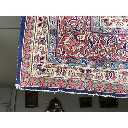 112 - Burgundy and blue ground Persian rug 390 x 325cm (worn - sold as seen)