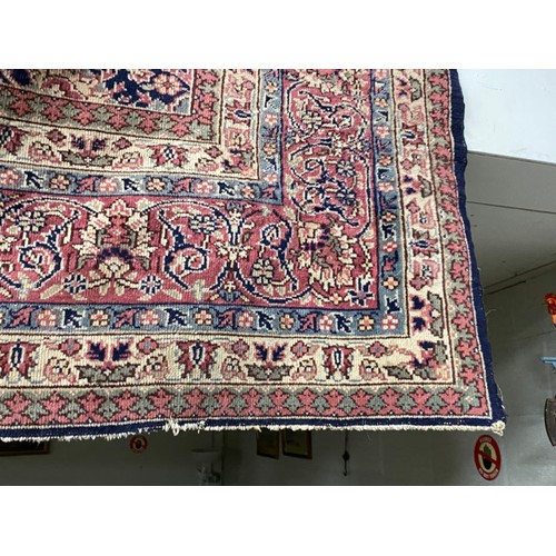 112 - Burgundy and blue ground Persian rug 390 x 325cm (worn - sold as seen)