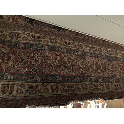 112 - Burgundy and blue ground Persian rug 390 x 325cm (worn - sold as seen)