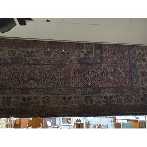 112 - Burgundy and blue ground Persian rug 390 x 325cm (worn - sold as seen)