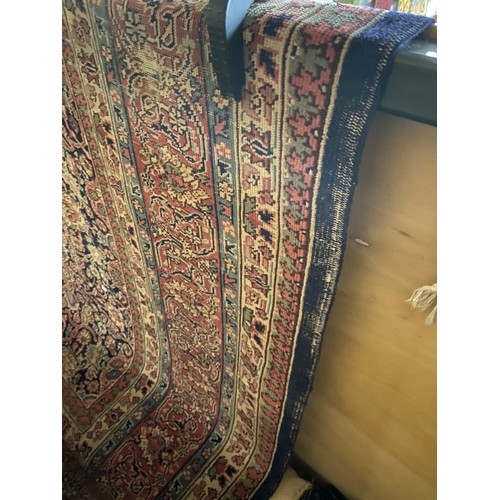 112 - Burgundy and blue ground Persian rug 390 x 325cm (worn - sold as seen)