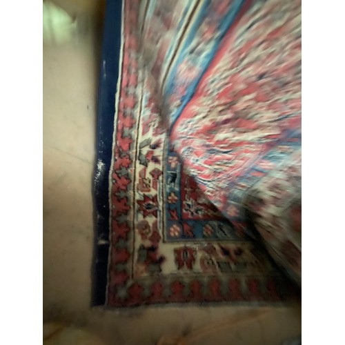 112 - Burgundy and blue ground Persian rug 390 x 325cm (worn - sold as seen)