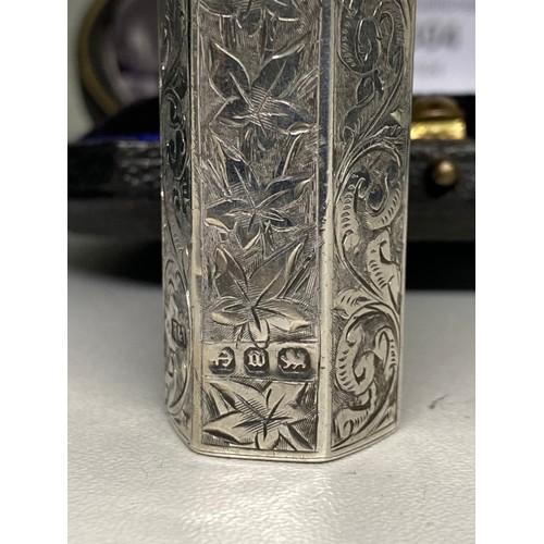 304 - Cased silver Hilliard & Thomason, Birmingham 1896 scent bottle with engraved decoration with glass s... 