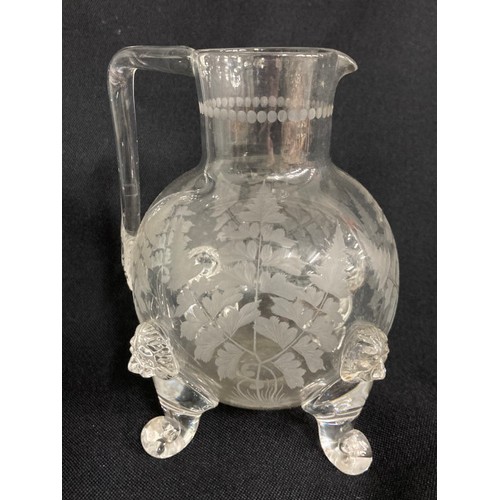 444 - John Ford, Holyrood Flint Glassworks, Edinburgh etched glass whisky jug with moulded lions mast prun... 