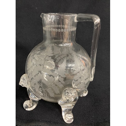 444 - John Ford, Holyrood Flint Glassworks, Edinburgh etched glass whisky jug with moulded lions mast prun... 