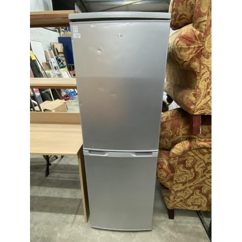 125 - LOGIK fridge freezer (some dents to door) 152H 50W 55D