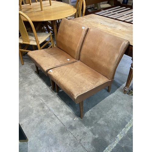 200 - Pair of tan leather (distressed) lounge chairs 70H 52W 66D