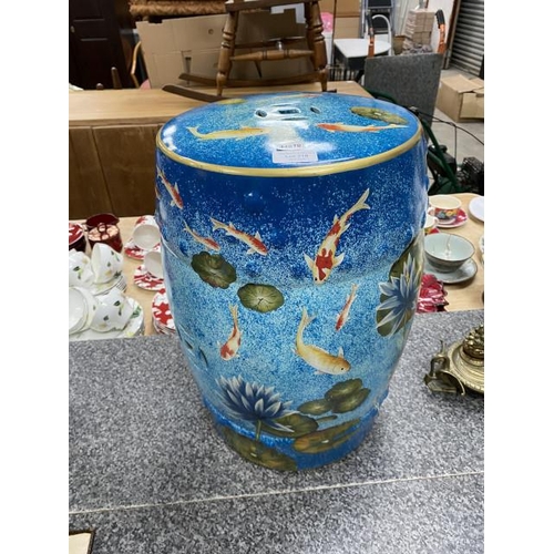 218 - Asian blue ceramic stool decorated with fish & lily pads 46H 30cm diameter