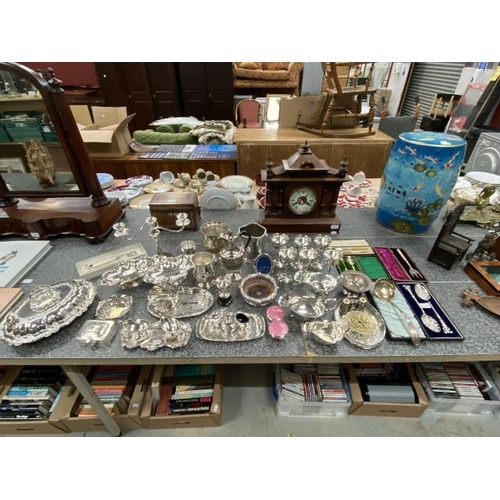 220 - Good collection of silver plate inc. candelabra, sauce boats, ladle, dishes, ice bucket, champagne b... 