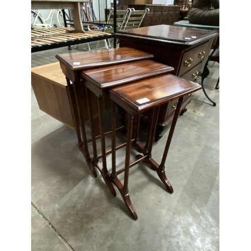 58 - Theodore Alexander mahogany nest of three tables 66H 42W 22D