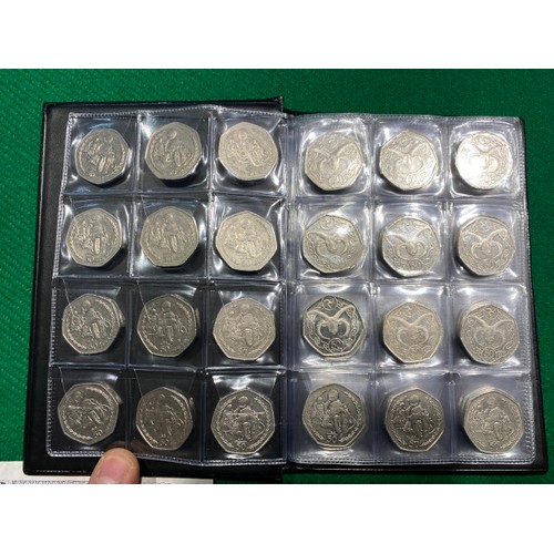 282 - Album of various Isle of Man and Guernsey circulated 50p's including Isle of Man Motorbike Race 1997... 