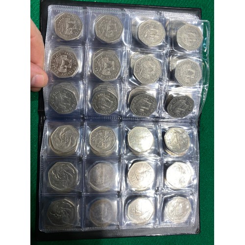 284 - Album of various Falkland Islands, Jersey, Isle of Man and Gibraltar 50p's and £2 coins including Fa... 