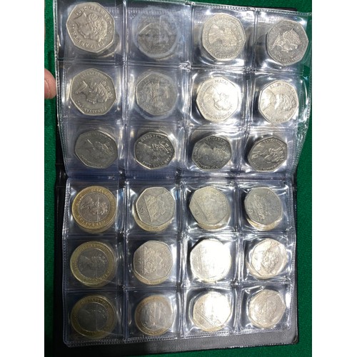 284 - Album of various Falkland Islands, Jersey, Isle of Man and Gibraltar 50p's and £2 coins including Fa... 