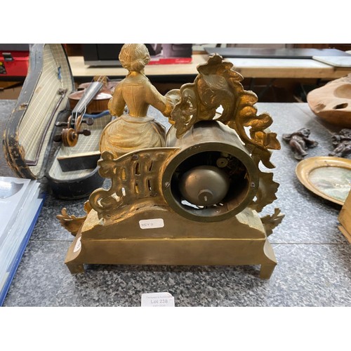 238 - 19th century ornate gilt figurine mantel clock with key (key in cabinet, untested)