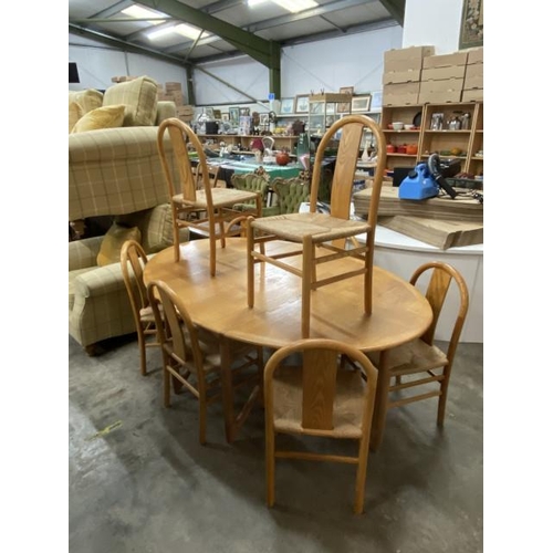 172 - 8 Annig Sarian for Montina, Italy beech, rush seated Bentwood chairs and a matching drop leaf table ... 