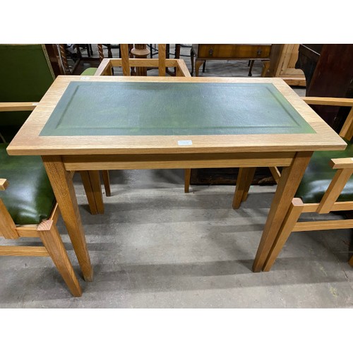 65 - Good quality oak dining table with one drawer and green leather inset 75H 90W 50D and 4 matching cha... 