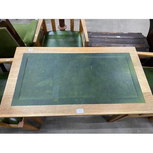 65 - Good quality oak dining table with one drawer and green leather inset 75H 90W 50D and 4 matching cha... 