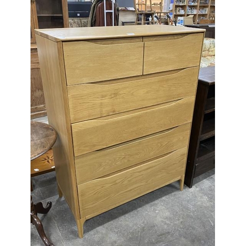 105 - Ercol oak 2 over 4 chest of drawers 123H 90W 46D