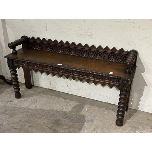 140 - Victorian gothic oak hall bench with finely carved details 65H 125W 32D