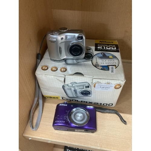 211 - Boxed Nikon Coolpix 2100 camera with charger & accessories & a Nikon Coolpix A10 camera (no smart ca... 