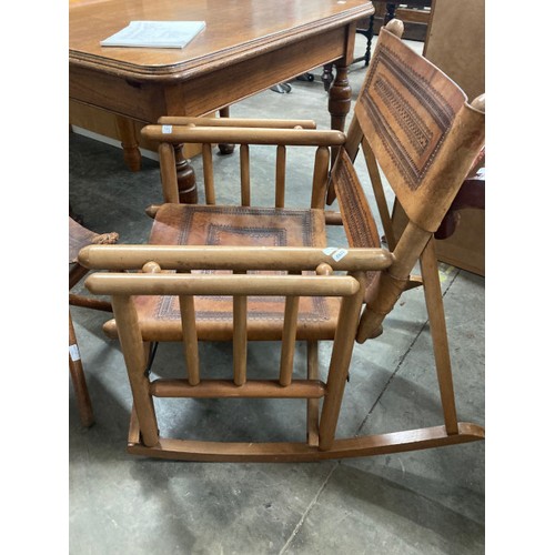 16 - Costa Rican Campaign style folding beech and leather rocking chair 84H 65W 83D and a matching stool ... 