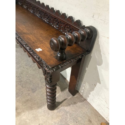 140 - Victorian gothic oak hall bench with finely carved details 65H 125W 32D