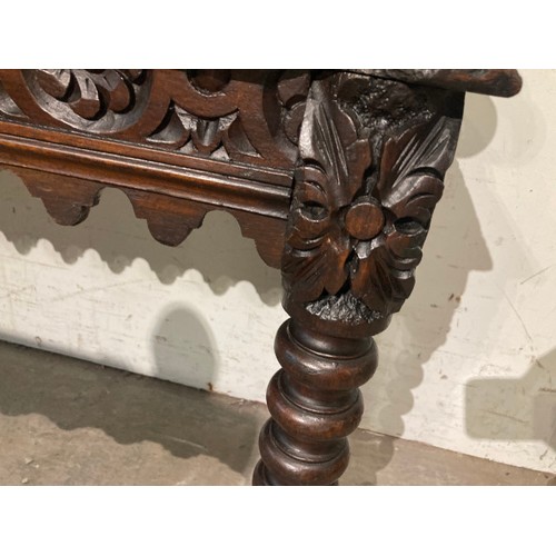 140 - Victorian gothic oak hall bench with finely carved details 65H 125W 32D