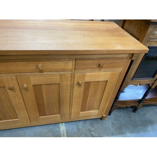 71 - Good quality oak sideboard with four doors and four drawers 85H 160W 55D