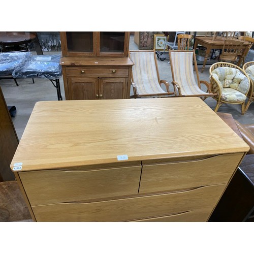 105 - Ercol oak 2 over 4 chest of drawers 123H 90W 46D