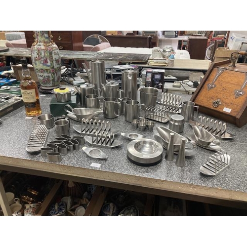 254 - 47 pieces of Robert Welch designed stainless steel wares mainly Old Hall inc. toast racks, sauce boa... 