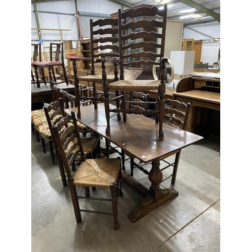 30 - Oak refectory table 73H 168W 66D and 6 oak ladder back chairs including 2 carvers