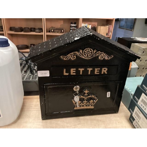 520 - Cast wall mounted black letter box with 2 keys (please note some paint missing on 