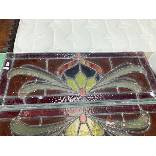 162 - 4 stained glass panels (as found) 2x 34 x 86cm, 38 x 81cm & 39 x 95cm