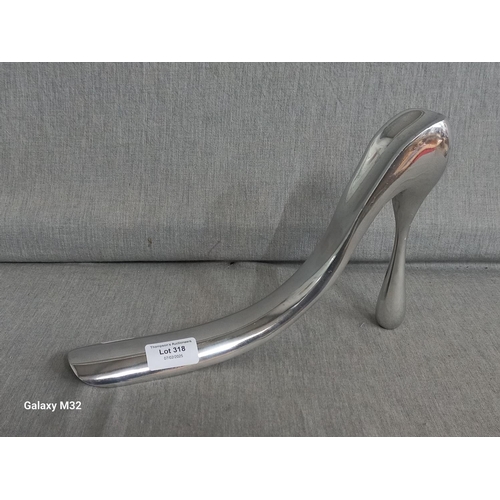 318 - Manolo Blahnik cast aluminium designer shoe horn for Habitat (40th anniversary)