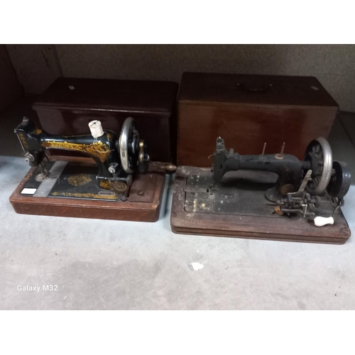 422 - Vintage singer sewing machine and one other