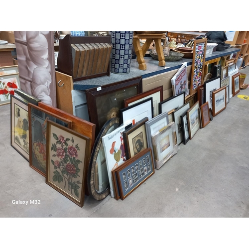 424 - Large collection of framed pictures and canvasses including prints, cigarette cards, tapestries, bla... 